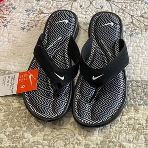 Brand new Nike slides.